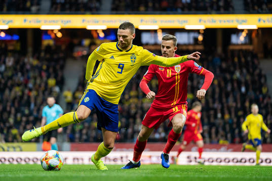 Marcus Berg and Nicusor Bancu of Romania