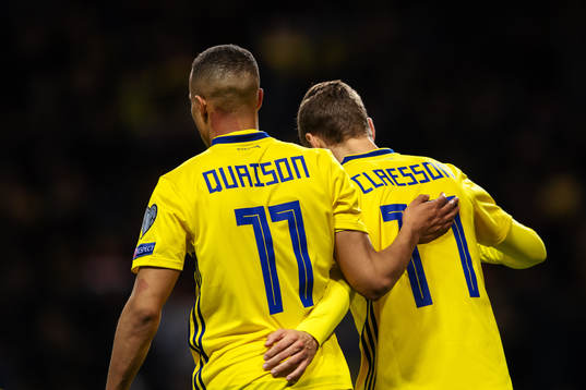 Robin Quaison and Viktor Claesson of Sweden celebrate
