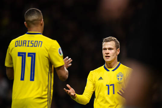 Robin Quaison and Viktor Claesson of Sweden celebrate
