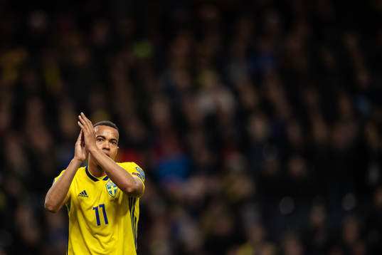 Robin Quaison of Sweden cheers the crowd when leaving the