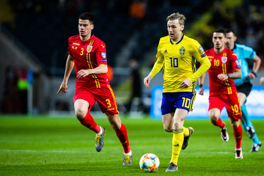 Emil Forsberg of Sweden and Tudor Baluta of Romania