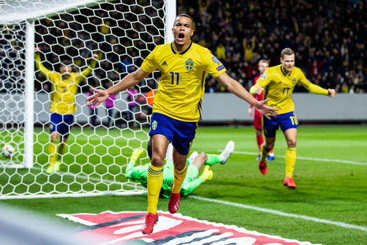 Robin Quaison of Sweden celebrates