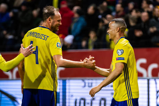 Robin Quaison and Andreas Granqvist of Sweden celebrates