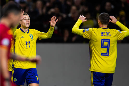 Viktor Claesson and Marcus Berg of Sweden celebrates