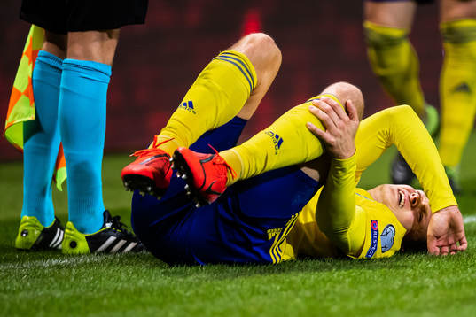 Viktor Claesson of Sweden is in pain