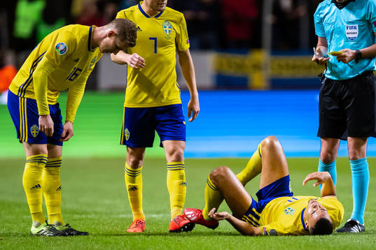 Robin Quaison of Sweden is in pain