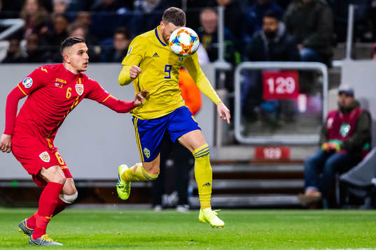 Cristian Manea of Romania and Marcus Berg of Sweden