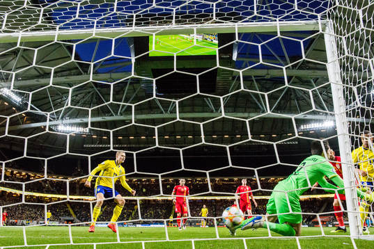 Robin Quaison of Sweden scores 1-0