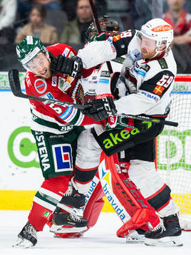 Frölundas Mats Rosseli Olsen och Malmö Redhawks Anton