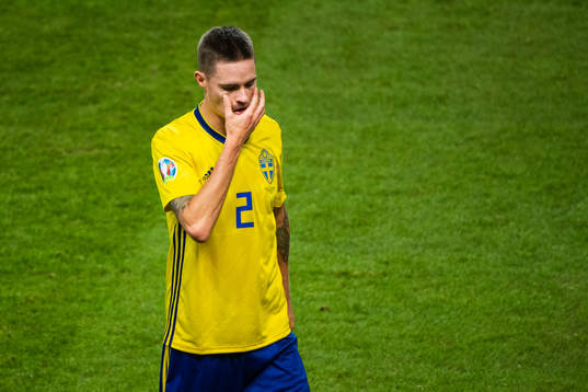 of Sweden Mikael Lustig looks dejected as he leaves the