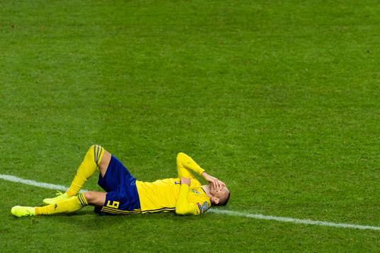 Marcus Berg of Sweden lies down