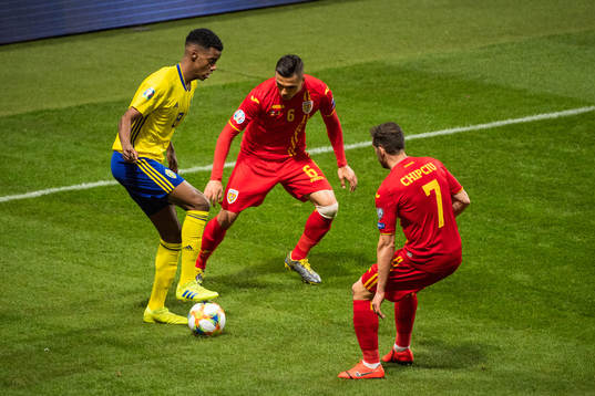 Alexander Isak of Swedenand Cristian Manea of Romania