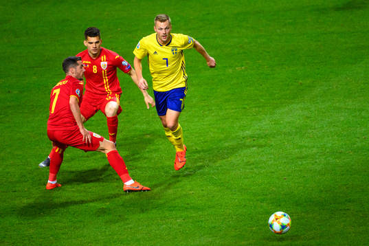 Sebastian Larsson of Sweden against Alexandru Chipciu and