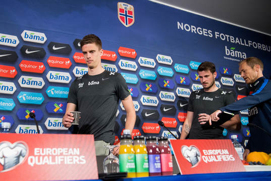 Markus Henriksen and Håvard Nordtveit of Norway arrive