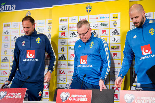 Andreas Granqvist and head coach Janne Andersson of the