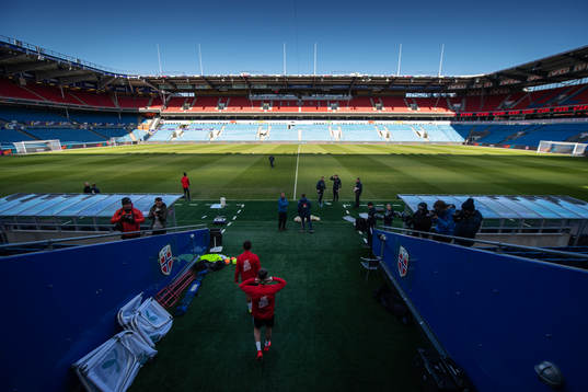 Players of the Norwegian national football team enter