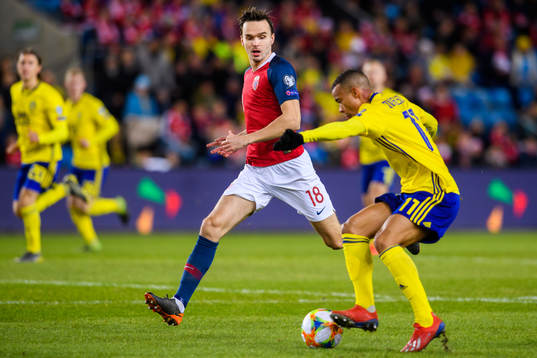 Ole Kristian Selnæs of Norway and Robin Quaison of Sweden
