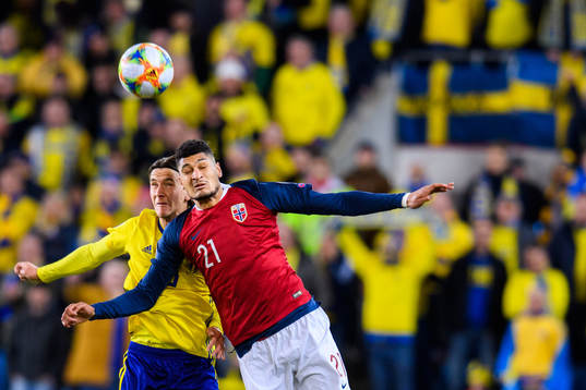 Kristoffer Olsson of Sweden in action with Bjørn Maars