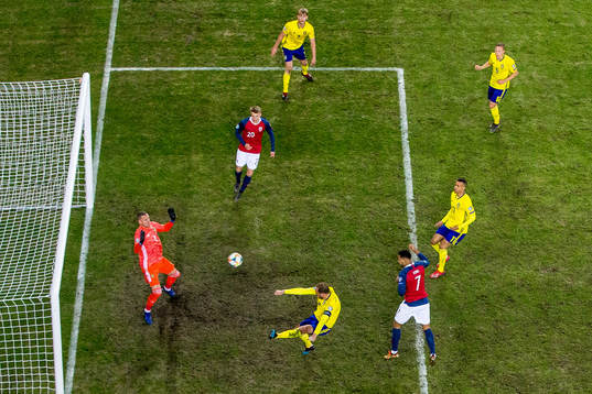 Joshua King of Norway scores 2-0 behind goalkeeper Robin