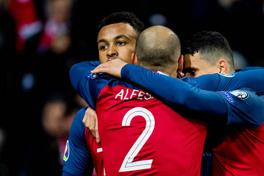 Joshua King of Norway celebrates with teammates Haitam