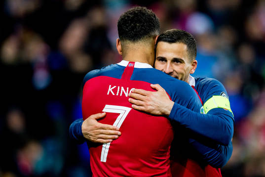 Joshua King of Norway celebrates with teammate Omar