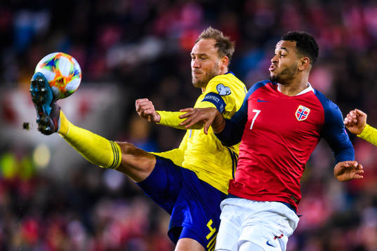 Andreas Granqvist of Sweden and Joshua King of Norway