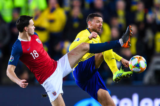 Ole Kristian Selnæs of Norway and Marcus Berg of Sweden