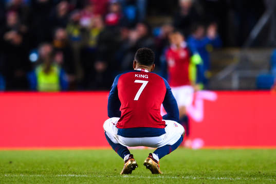 Joshua King of Norway looks dejected