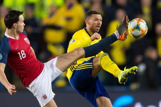 Ole Kristian Selnæs of Norway and Marcus Berg of Sweden