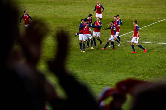 Bjørn Maars Johnsen of Norway celebrates with his teammates