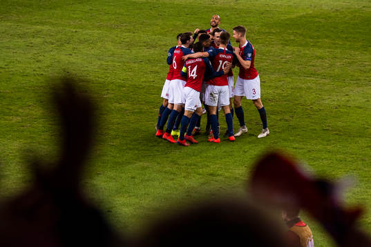 Bjørn Maars Johnsen of Norway celebrates with his teammates