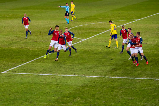 Bjørn Maars Johnsen of Norway celebrates with his teammates