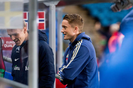 Martin Ødegaard of Norway and Sam Larsson of Sweden