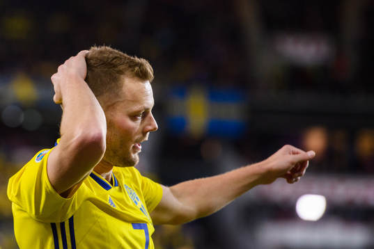 Sebastian Larsson of Sweden looks dejected