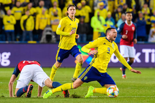 Marcus Berg of Sweden and Markus Henriksen of Norway