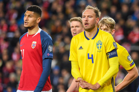 Bjørn Maars Johnsen of Norway and Andreas Granqvist of