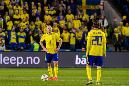 Sebastian Larsson of Sweden looks dejected
