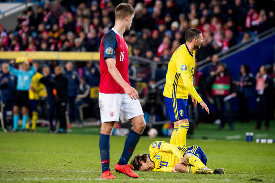 Kristoffer Olsson of Sweden with an injury