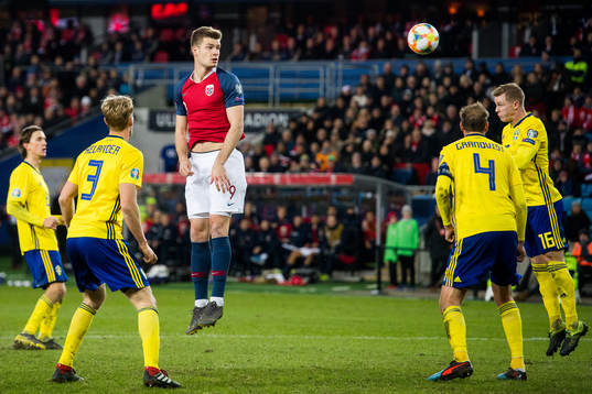 Alexander Sørloth of Norway and Emil Krafth of Sweden