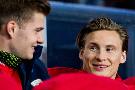 Alexander Sørloth and Jonas Svensson of Norway