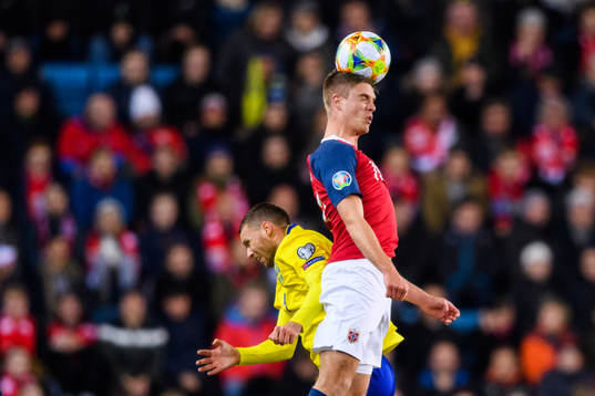 Marcus Berg of Sweden and Markus Henriksen of Norway