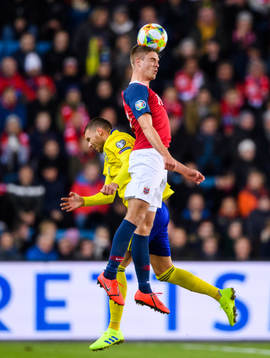 Marcus Berg of Sweden and Markus Henriksen of Norway