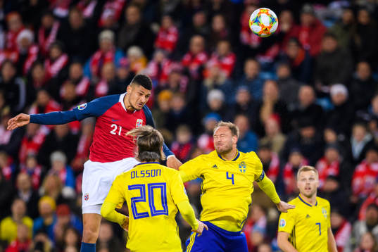 Bjørn Maars Johnsen of Norway and Andreas Granqvist of