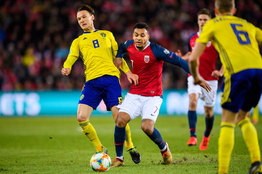 Albin Ekdal of Sweden and Joshua King of Norway