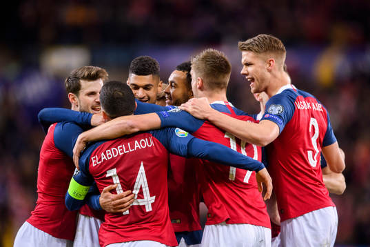 Bjørn Maars Johnsen of Norway celebrates with teammates