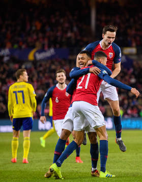 Bjørn Maars Johnsen of Norway celebrates with teammates