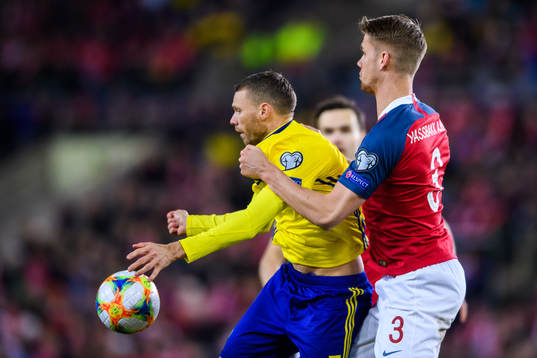 Marcus Berg of Sweden and Kristoffer Ajer of Norway