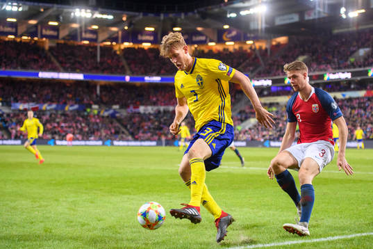 Filip Helander of Sweden and Kristoffer Ajer of Norway