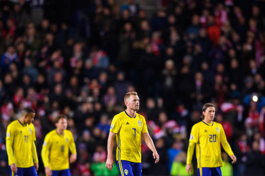 Sebastian Larsson of Sweden looks dejected