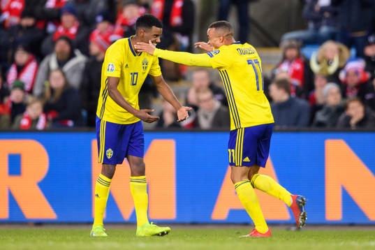 Robin Quaison celebrates with Alexander Isak of Sweden